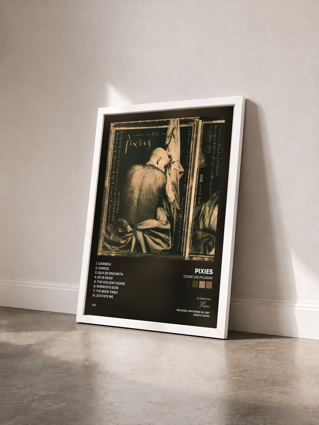 #blanc Tableau de l'album Come On Pilgrim de Pixies vu de trois quarts, cadre blanc