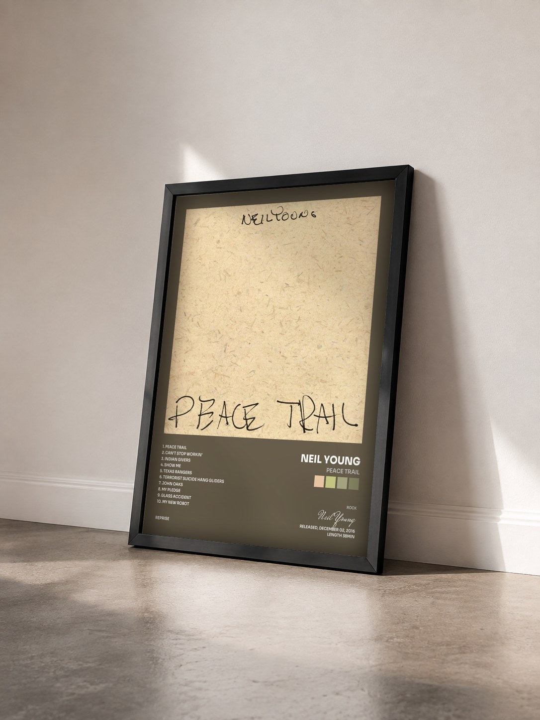 #noir Tableau de l'album Peace Trail de Neil Young vu de trois quarts, cadre noir