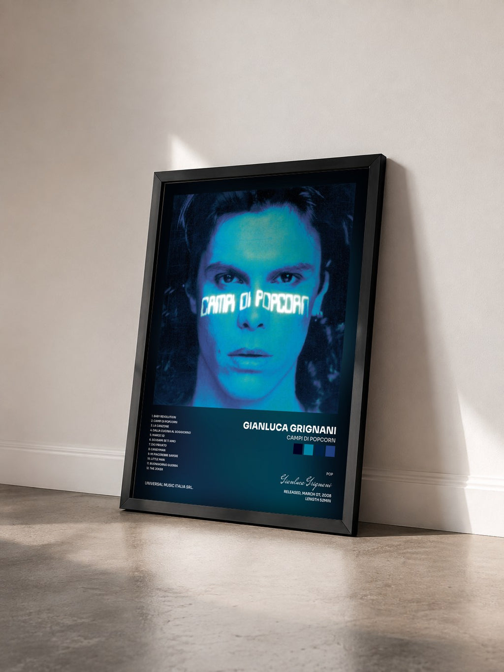#noir Tableau de l'album Campi Di Popcorn de Gianluca Grignani vu de trois quarts, cadre noir