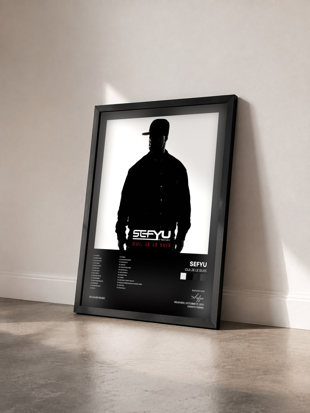 #noir Tableau de l'album Oui Je Le Suis de Sefyu vu de trois quarts, cadre noir