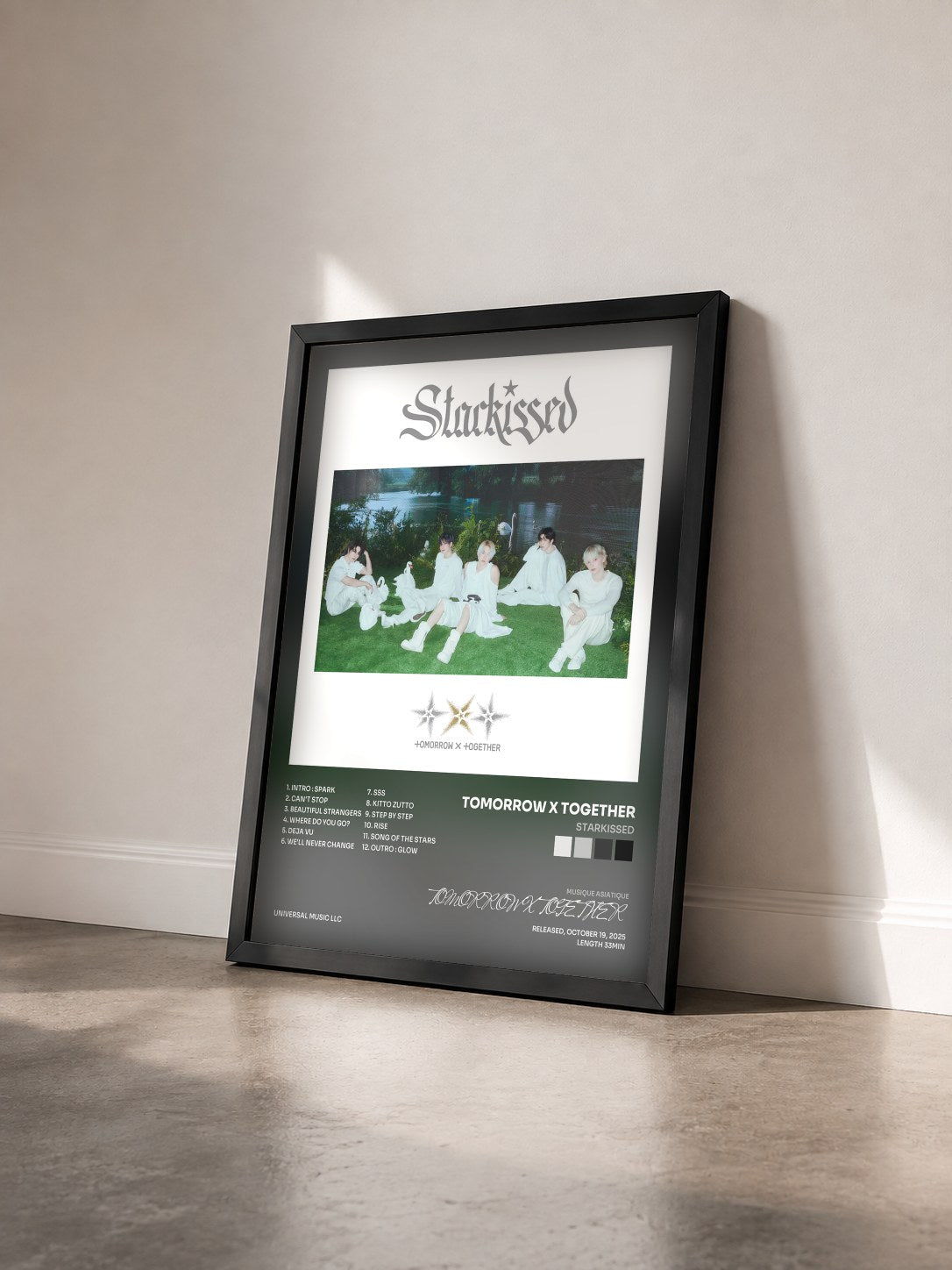#noir Starkissed by TOMORROW X TOGETHER as a framed art print seen at an angle, black frame