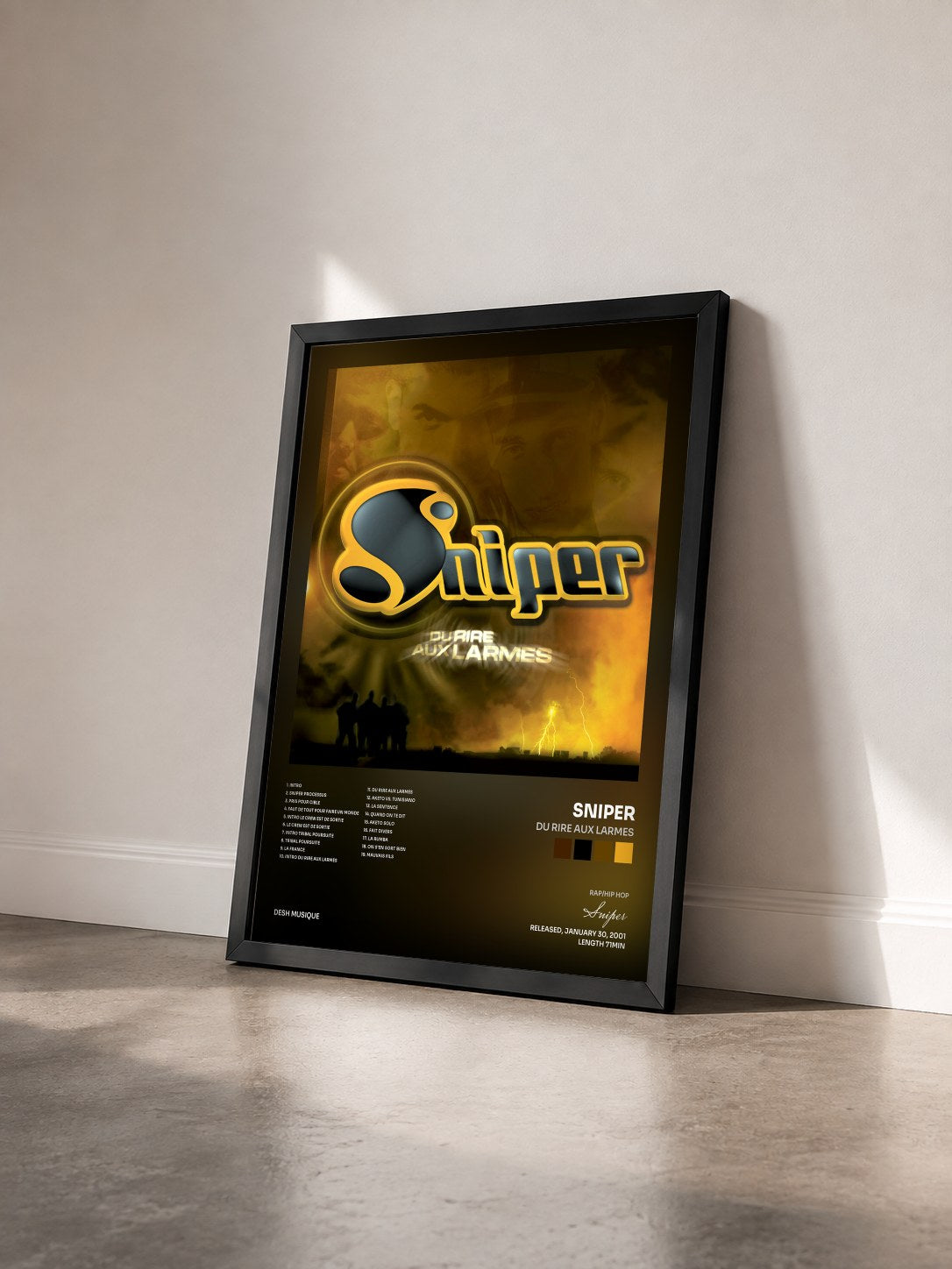#noir Du rire aux larmes by Sniper as a framed art print seen at an angle, black frame