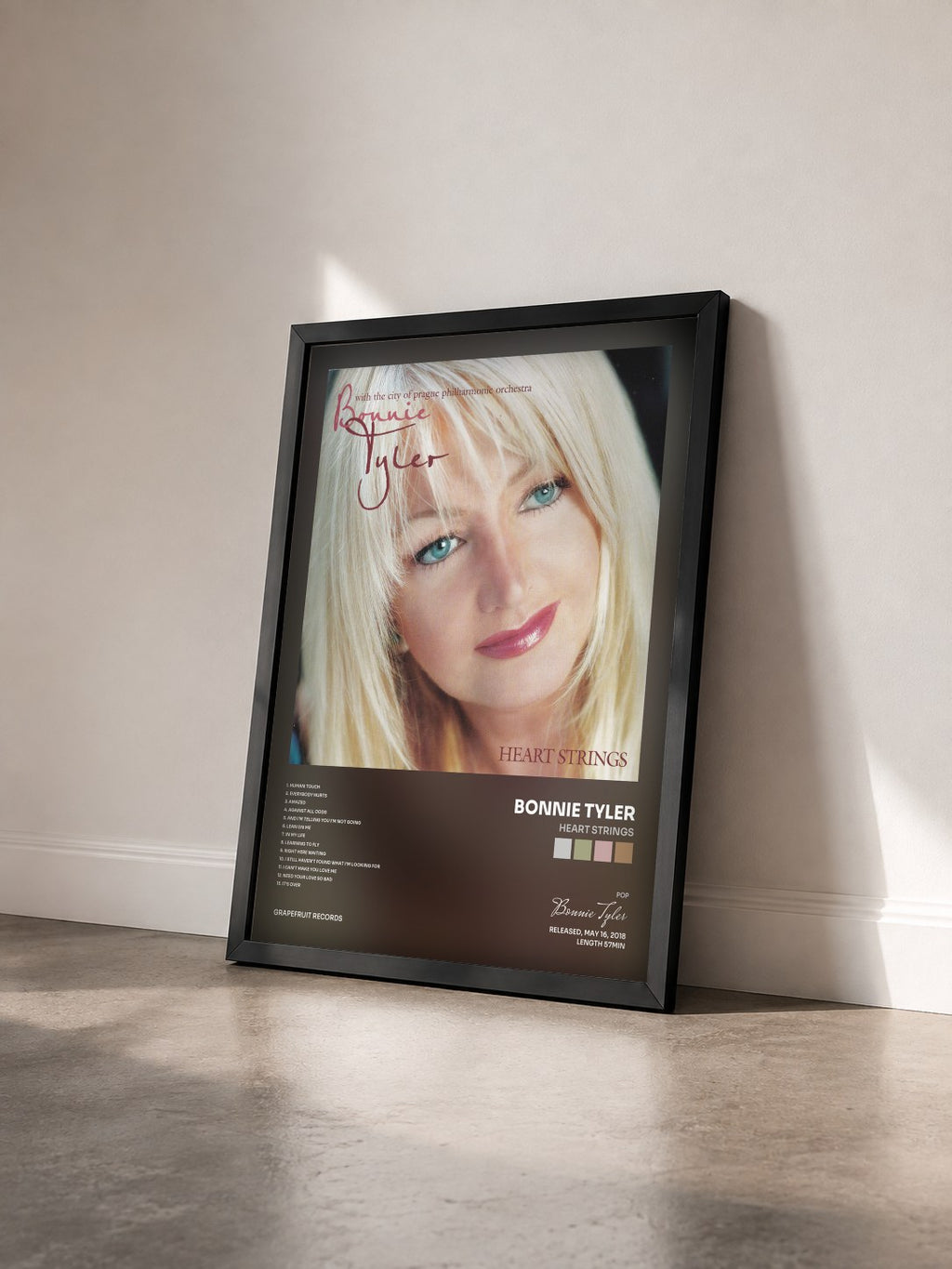#noir Heart Strings by Bonnie Tyler as a framed art print seen at an angle, black frame