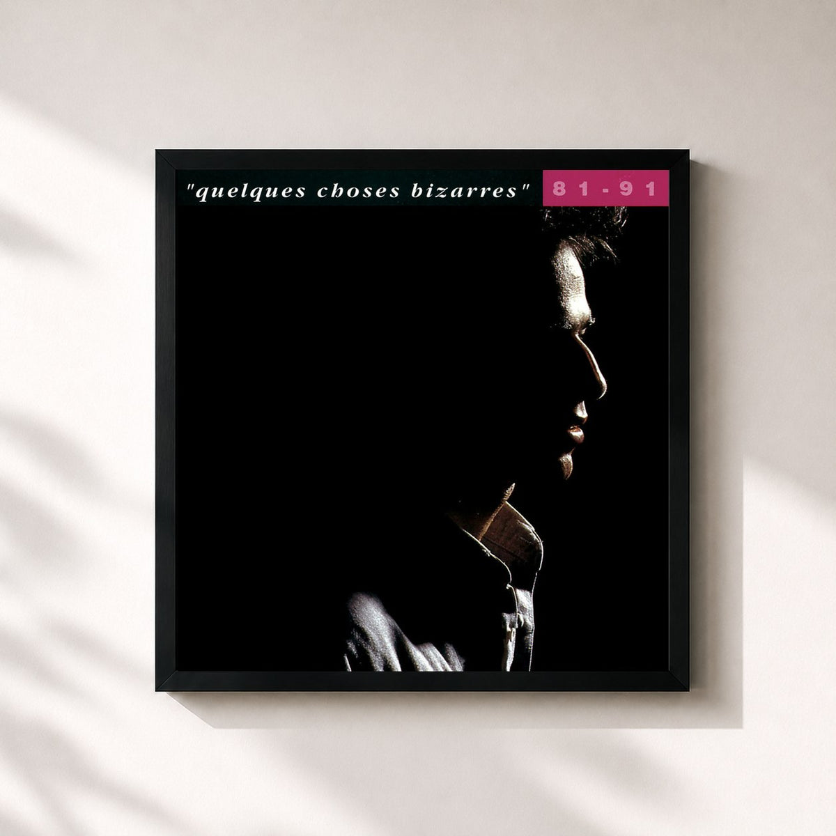 #noir Tableau carré de l'album Quelques choses bizarres (81-91) de Jean-Jacques Goldman, cadre noir 32x32 cm