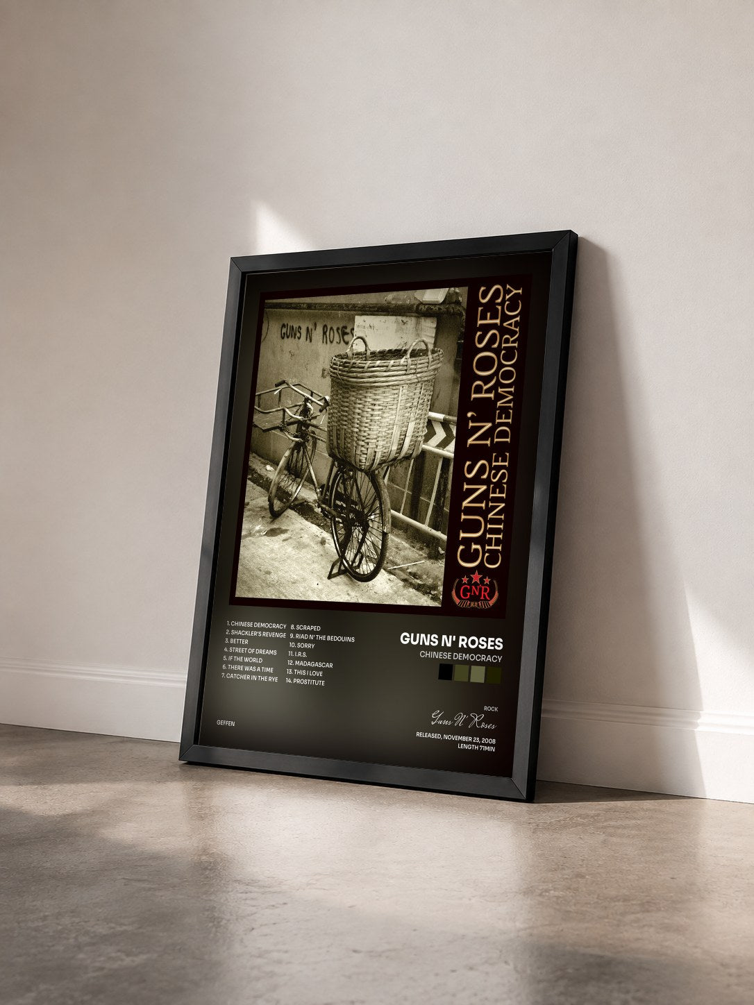 #noir Tableau de l'album Chinese Democracy de Guns N' Roses vu de trois quarts, cadre noir