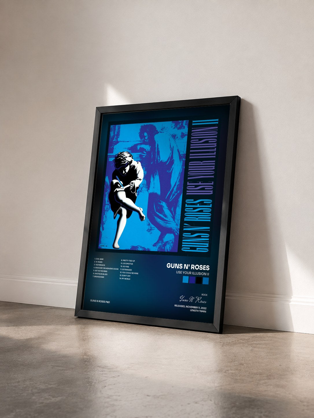 #noir Tableau de l'album Use Your Illusion II de Guns N' Roses vu de trois quarts, cadre noir