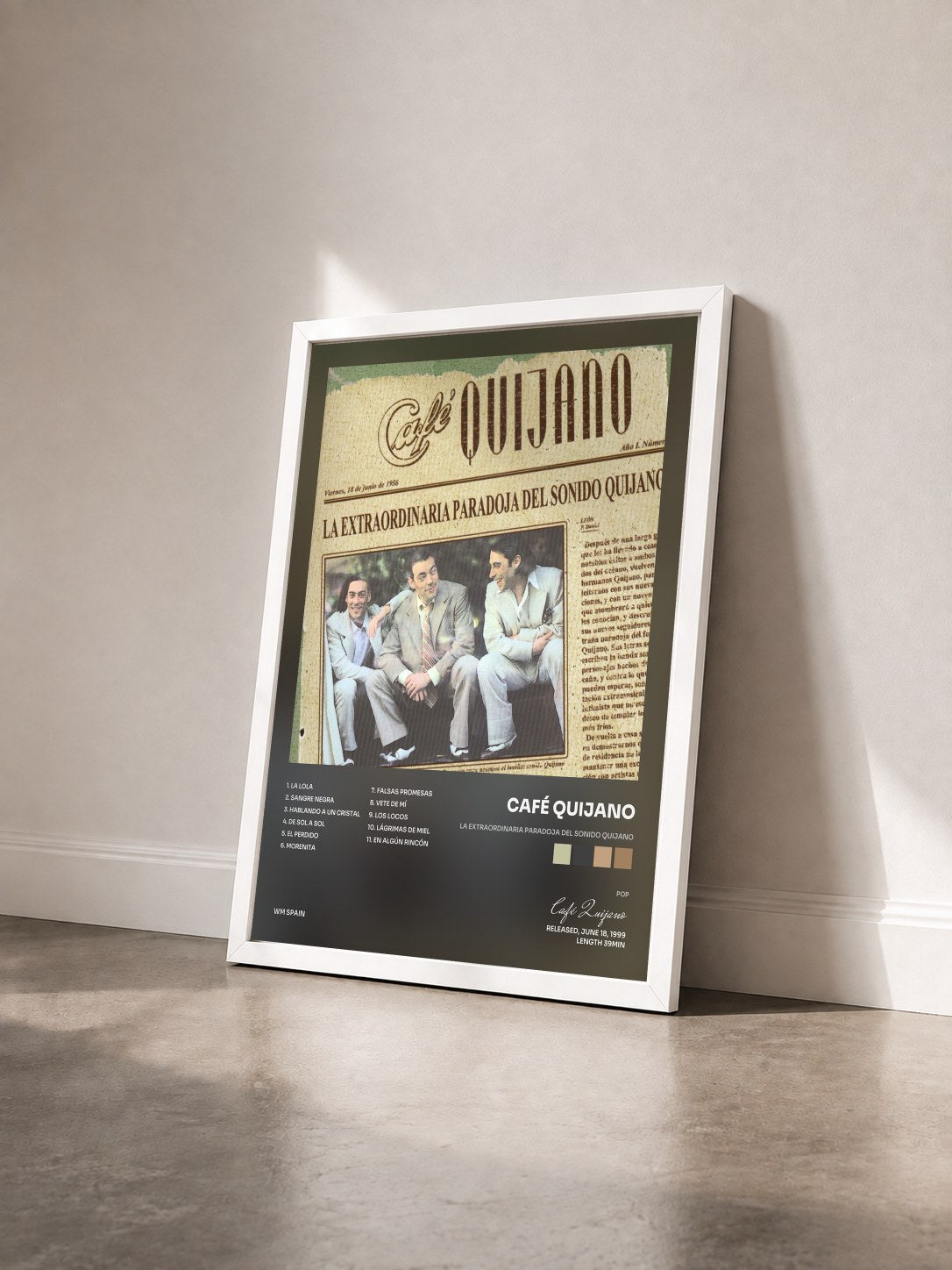 #blanc Tableau de l'album La Extraordinaria Paradoja Del Sonido Quijano de Café Quijano vu de trois quarts, cadre blanc