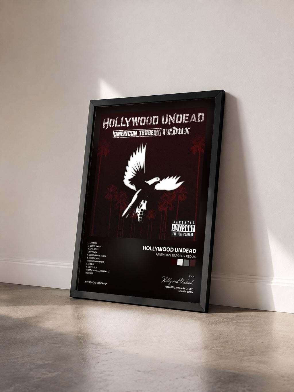 #noir Tableau de l'album American Tragedy Redux de Hollywood Undead vu de trois quarts, cadre noir