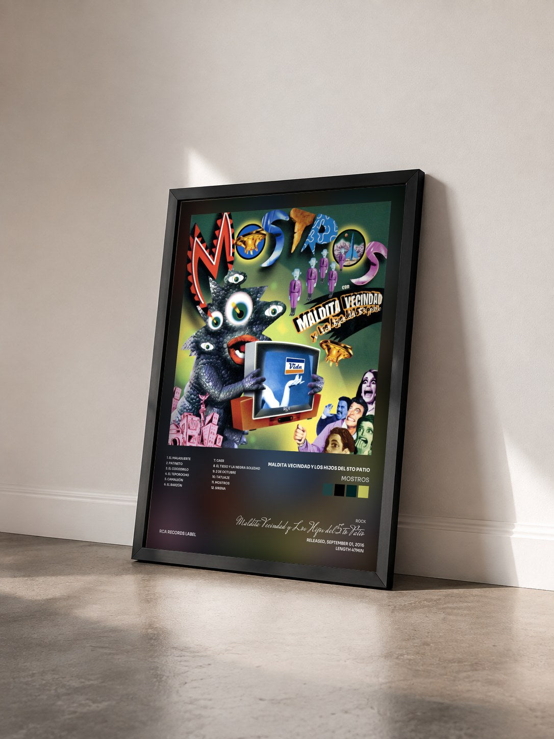 #noir Tableau de l'album Mostros de Maldita Vecindad y Los Hijos del 5to Patio vu de trois quarts, cadre noir