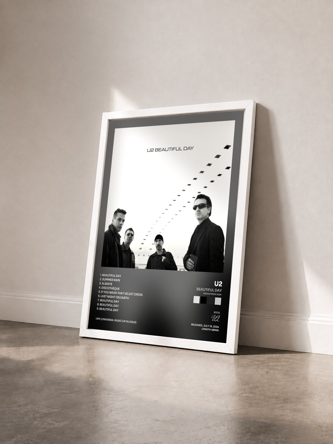 #blanc Tableau de l'album Beautiful Day (Remastered 2024) de U2 vu de trois quarts, cadre blanc