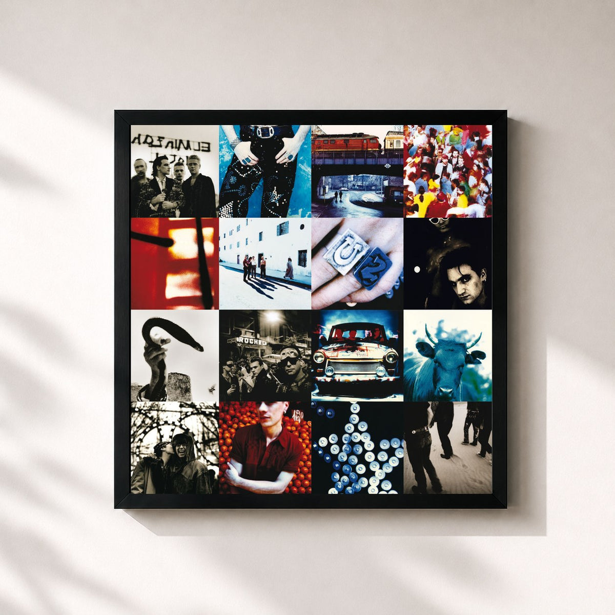 #noir Achtung Baby by U2 as a square framed art print, black 32x32 cm frame
