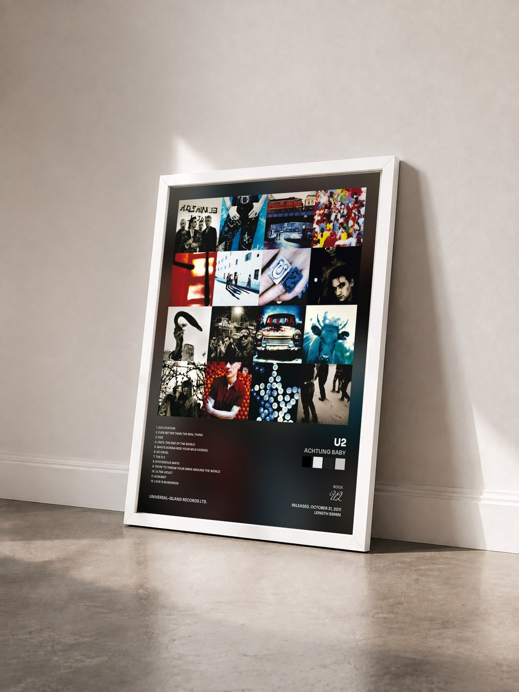 #blanc Achtung Baby von U2 als gerahmter Kunstdruck von schräg gesehen, weißer Rahmen