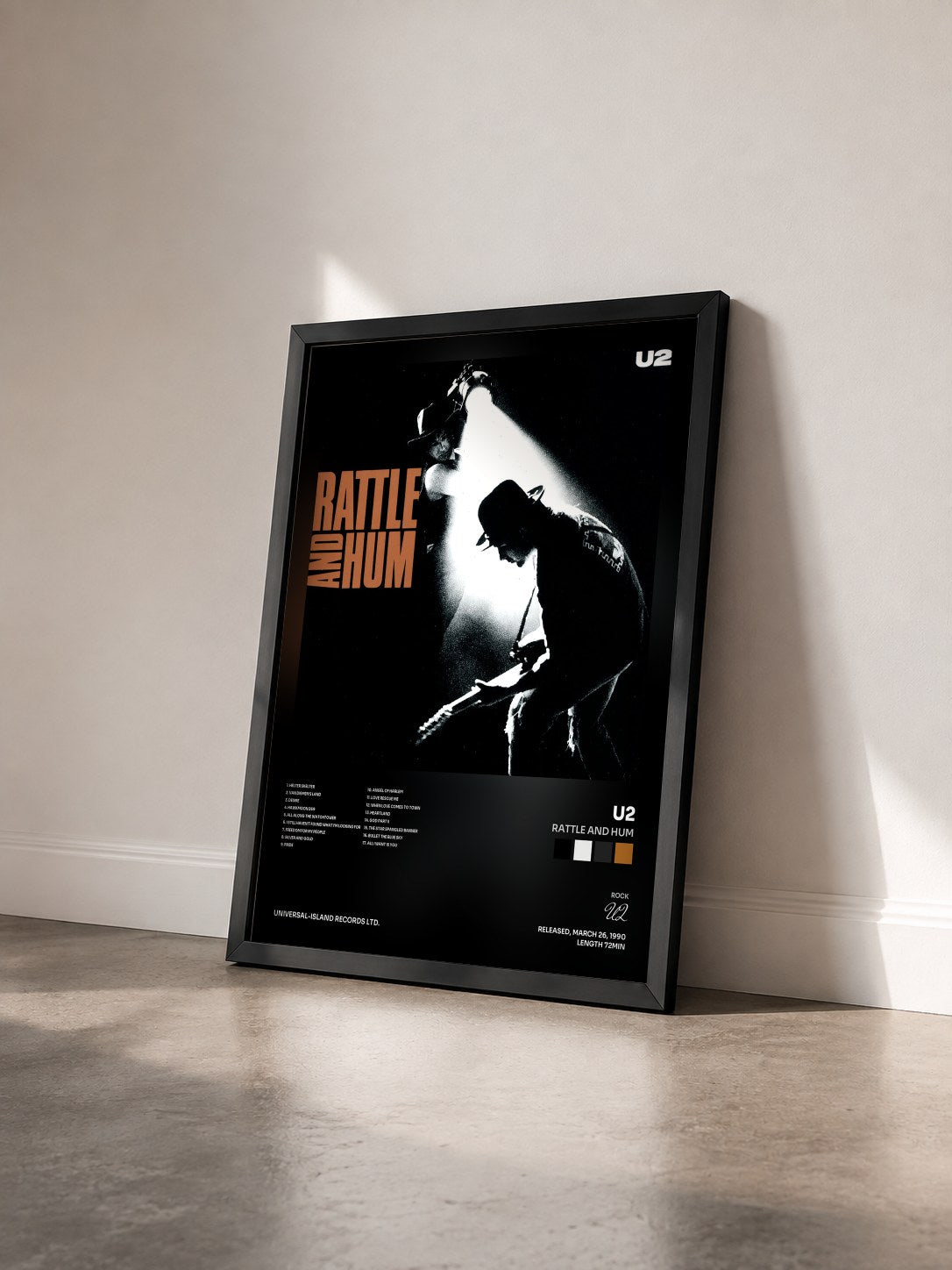 #noir Rattle And Hum by U2 as a framed art print seen at an angle, black frame