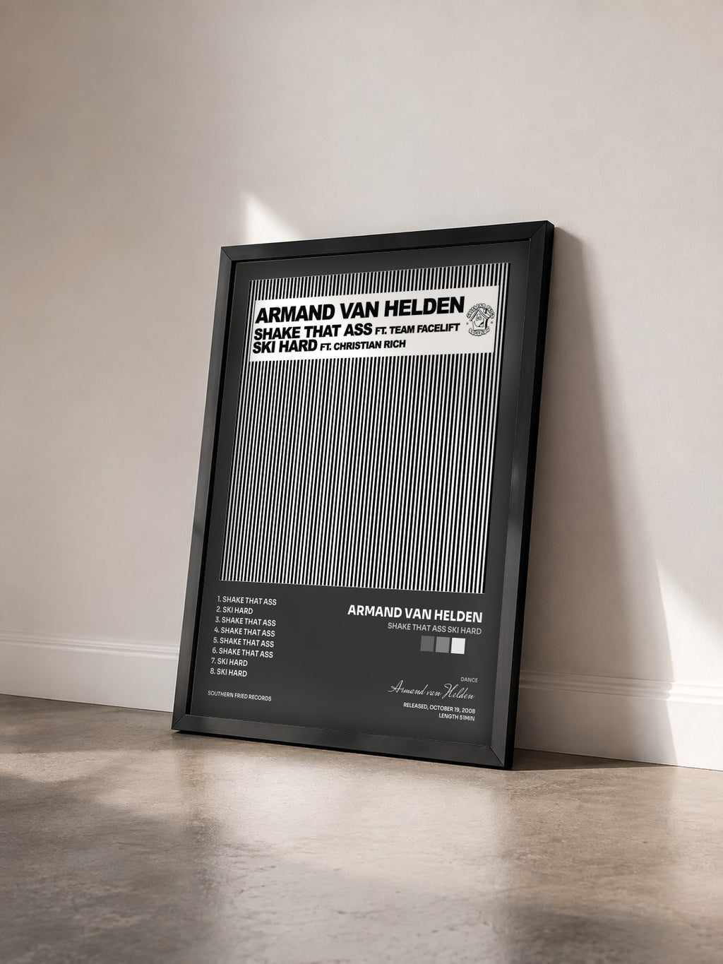 #noir Tableau de l'album Shake That Ass Ski Hard de Armand van Helden vu de trois quarts, cadre noir