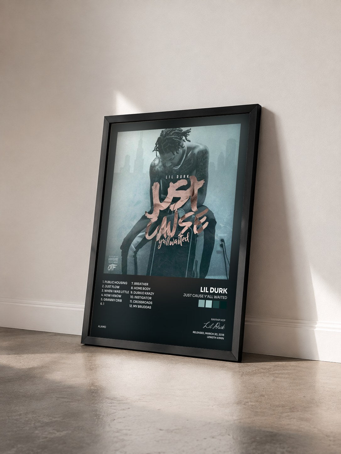 #noir Tableau de l'album Just Cause Yall Waited de Lil Durk vu de trois quarts, cadre noir