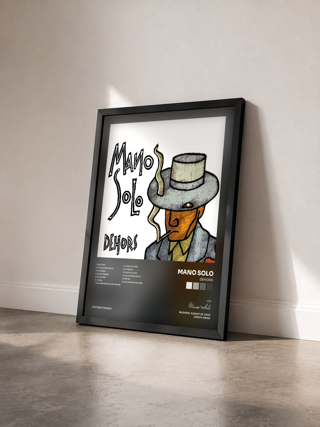 #noir Tableau de l'album Dehors de Mano Solo vu de trois quarts, cadre noir