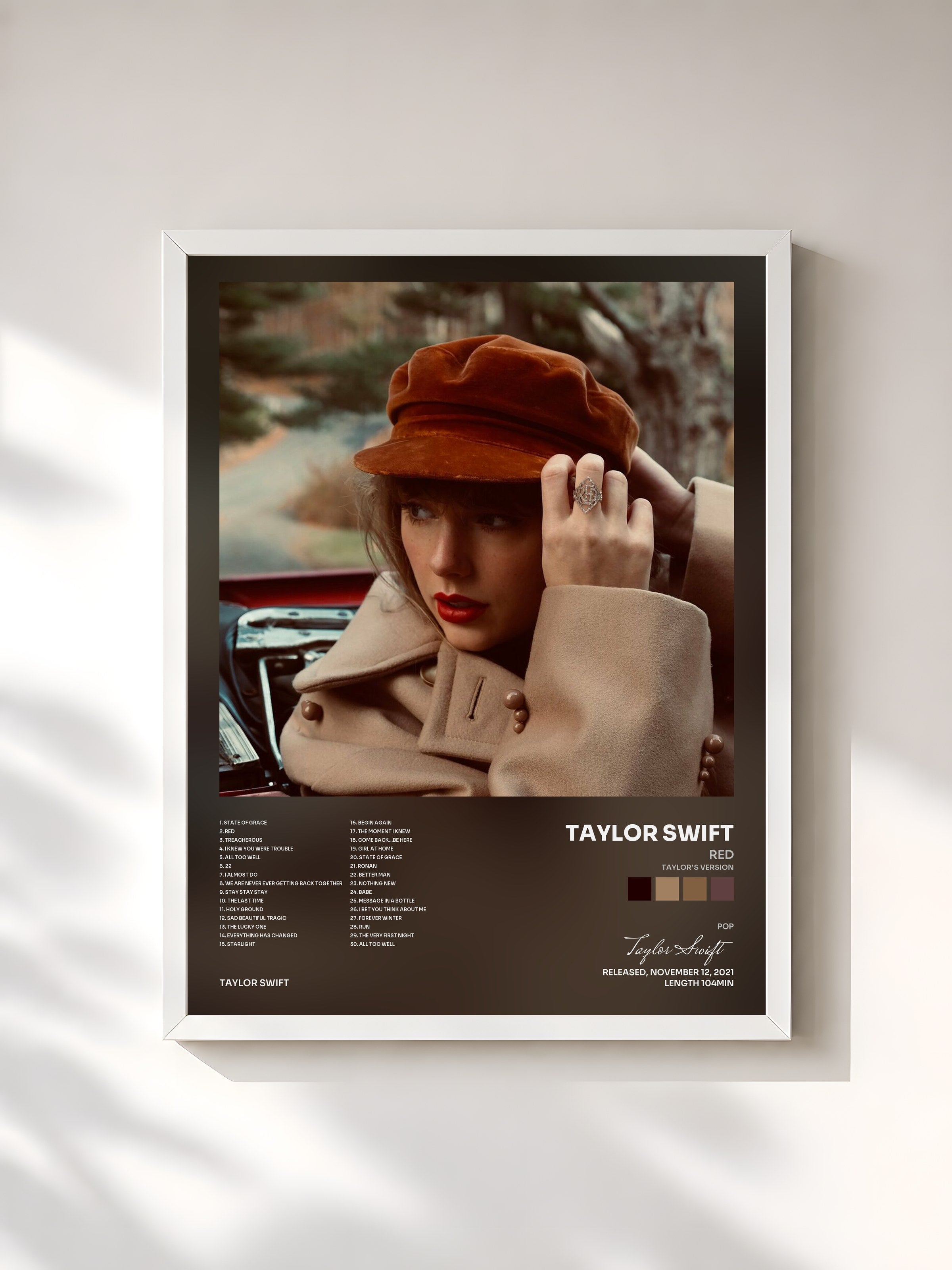 #blanc Red (Taylor's Version) by Taylor Swift as a framed art print, white frame, printed and framed in France