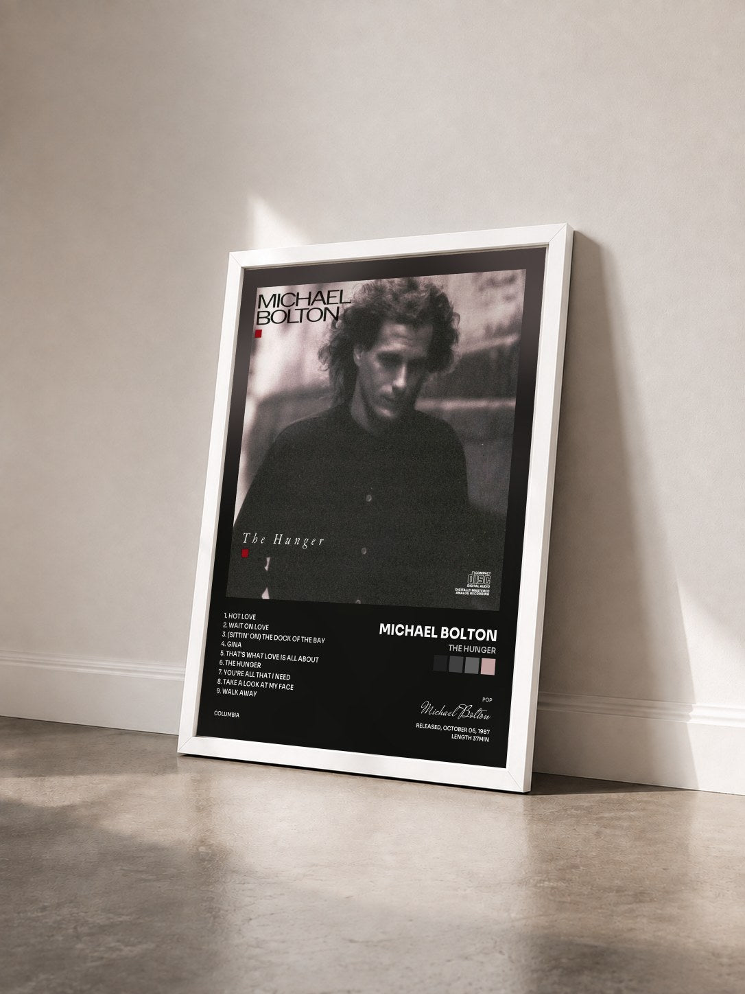 #blanc The Hunger by Michael Bolton as a framed art print seen at an angle, white frame