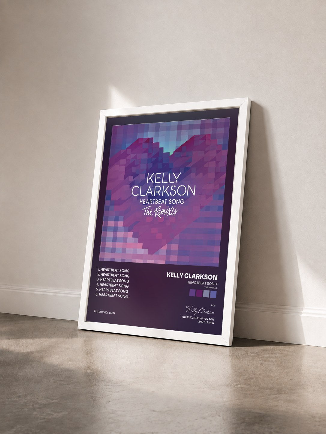 #blanc Tableau de l'album Heartbeat Song (The Remixes) de Kelly Clarkson vu de trois quarts, cadre blanc