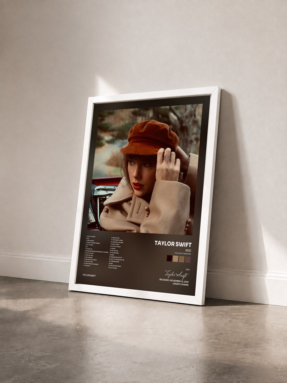 #blanc Red (Taylor's Version) by Taylor Swift as a framed art print seen at an angle, white frame