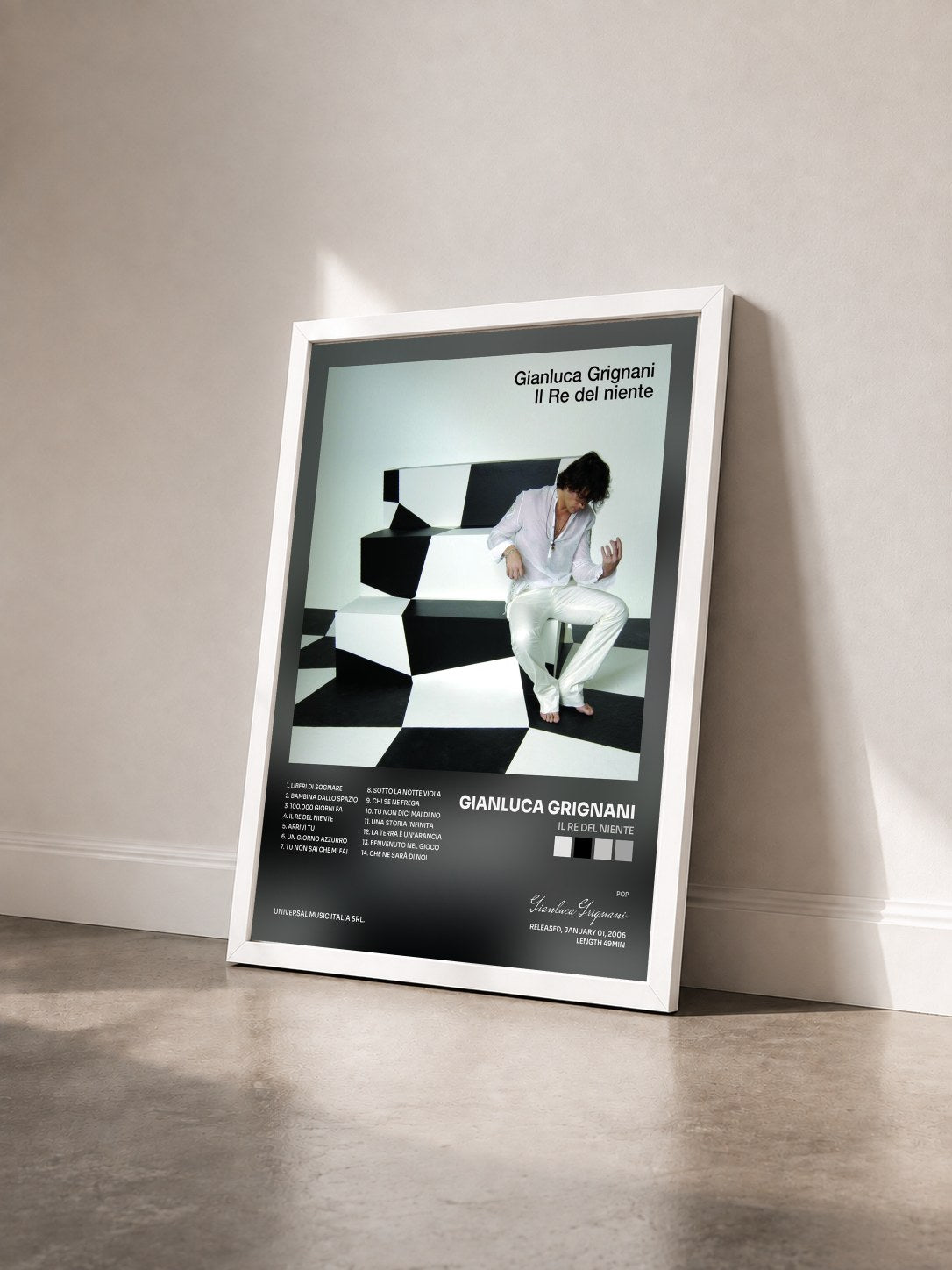 #blanc Tableau de l'album Il Re Del Niente de Gianluca Grignani vu de trois quarts, cadre blanc