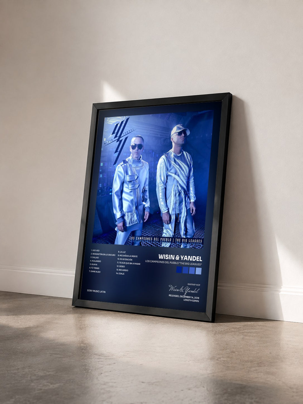 #noir Tableau de l'album Los Campeones del Pueblo "The Big Leagues" de Wisin & Yandel vu de trois quarts, cadre noir