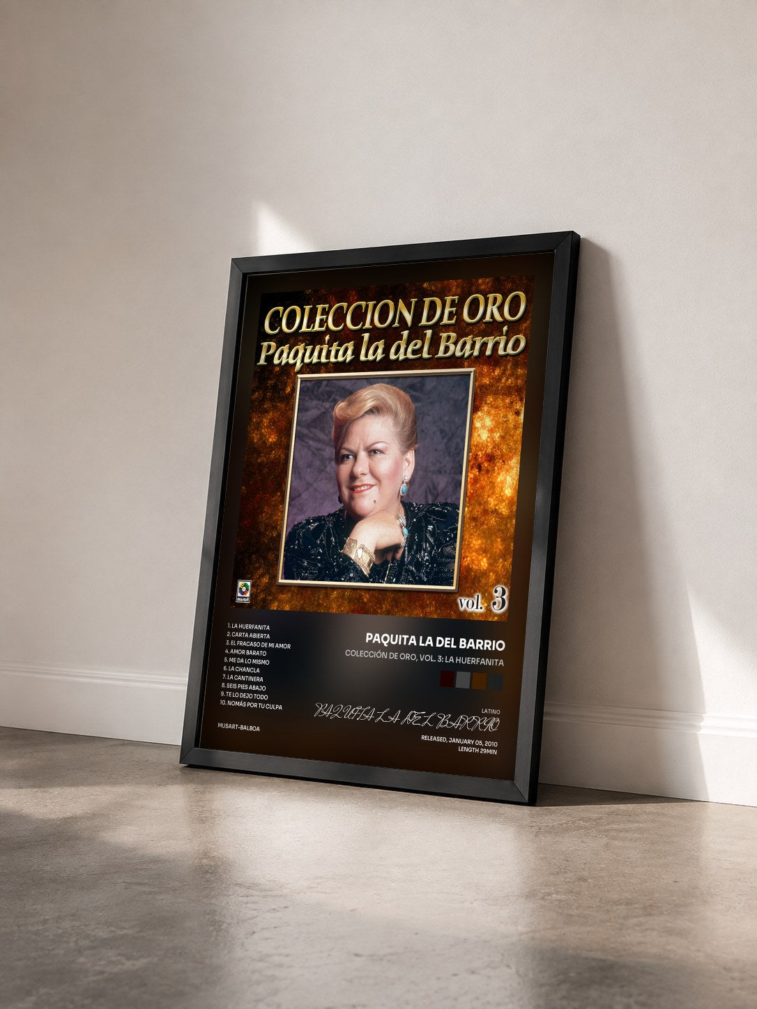 #noir Tableau de l'album Colección De Oro, Vol. 3: La Huerfanita de PAQUITA LA DEL BARRIO vu de trois quarts, cadre noir