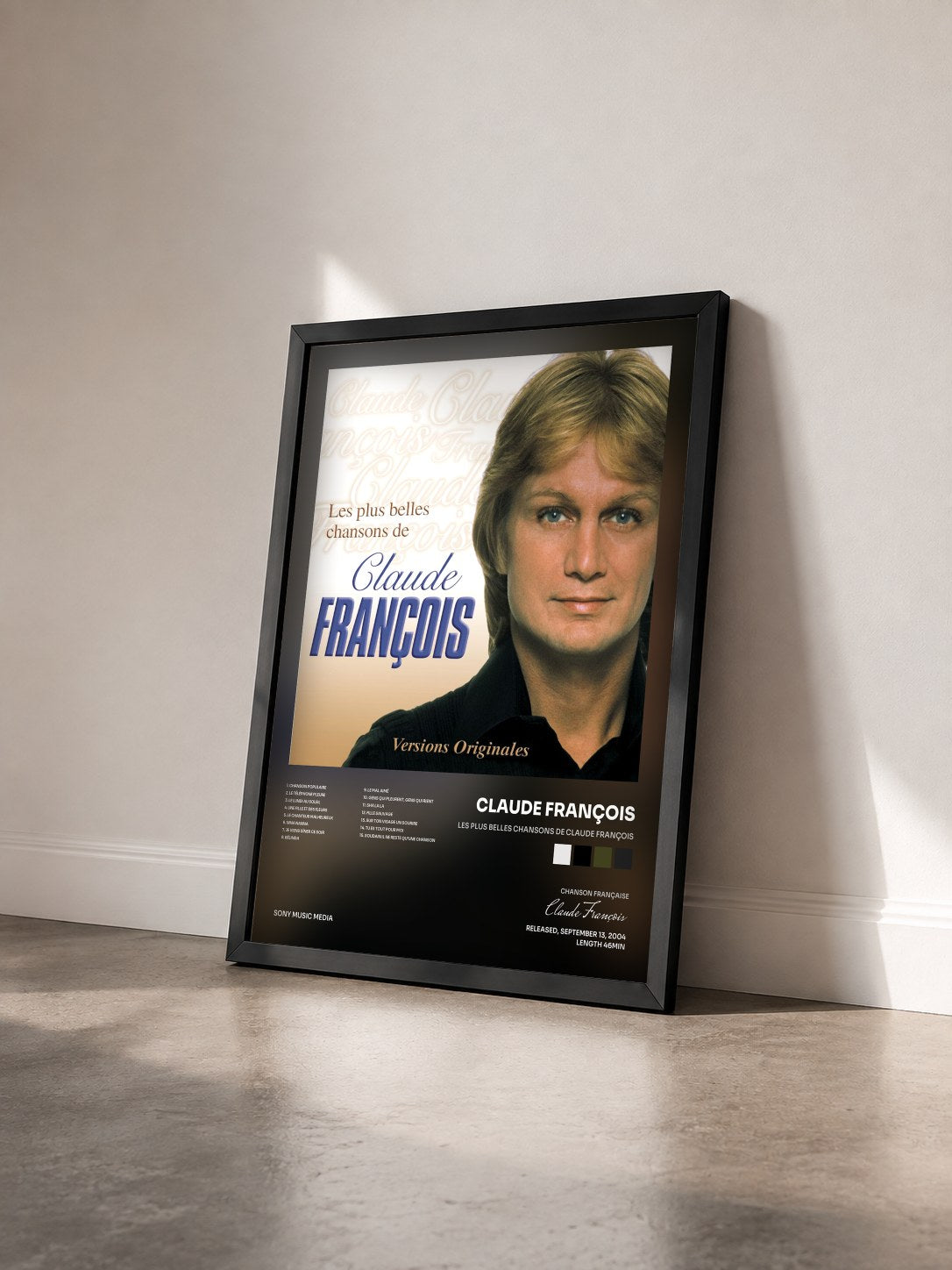 #noir Tableau de l'album Les Plus Belles Chansons De Claude François de Claude François vu de trois quarts, cadre noir