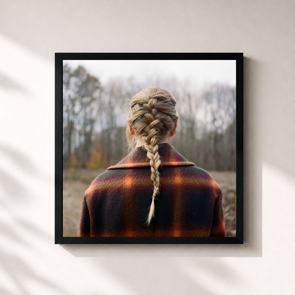 #noir evermore by Taylor Swift as a square framed art print, black 32x32 cm frame