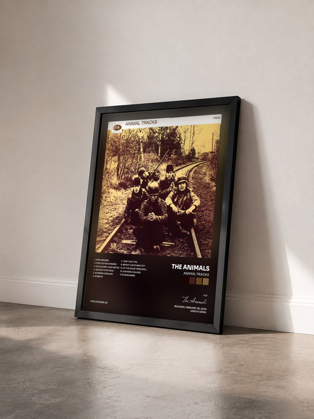 #noir Tableau de l'album Animal Tracks de The Animals vu de trois quarts, cadre noir