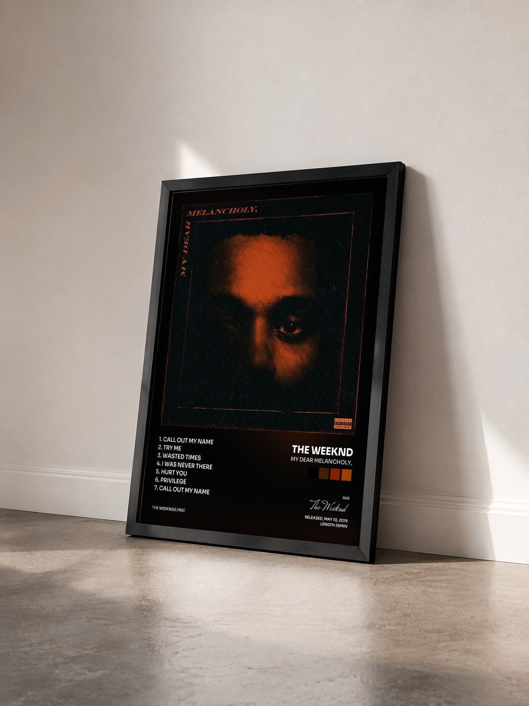 #noir Tableau de l'album My Dear Melancholy, de The Weeknd vu de trois quarts, cadre noir