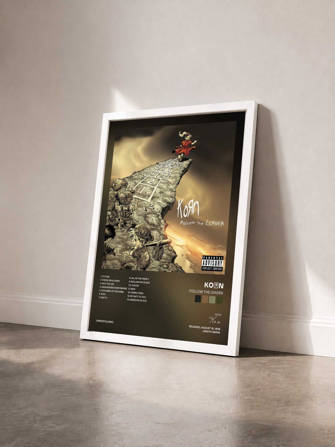 #blanc Follow The Leader by KoЯn as a framed art print seen at an angle, white frame