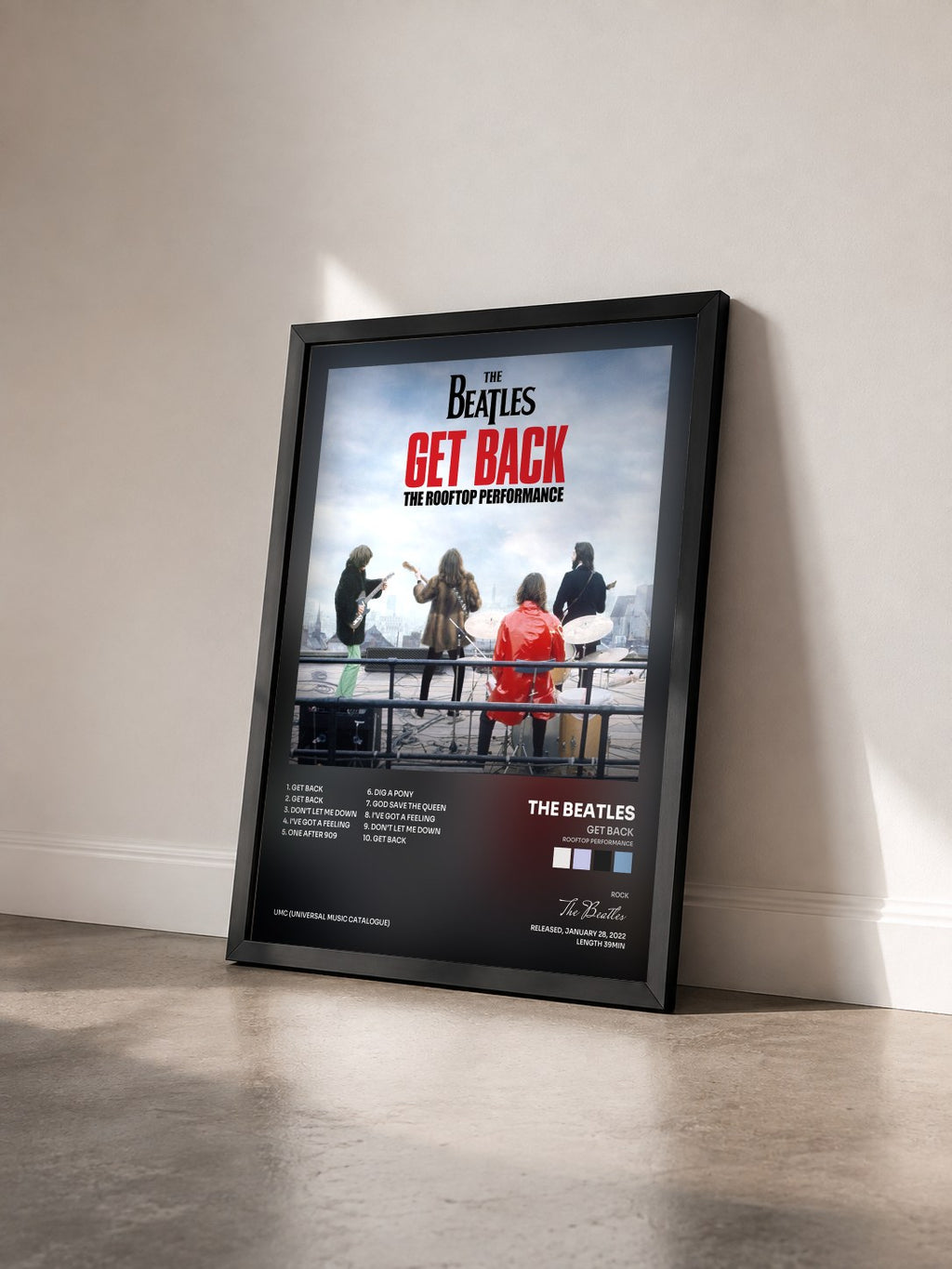 #noir Tableau de l'album Get Back (Rooftop Performance) de The Beatles vu de trois quarts, cadre noir