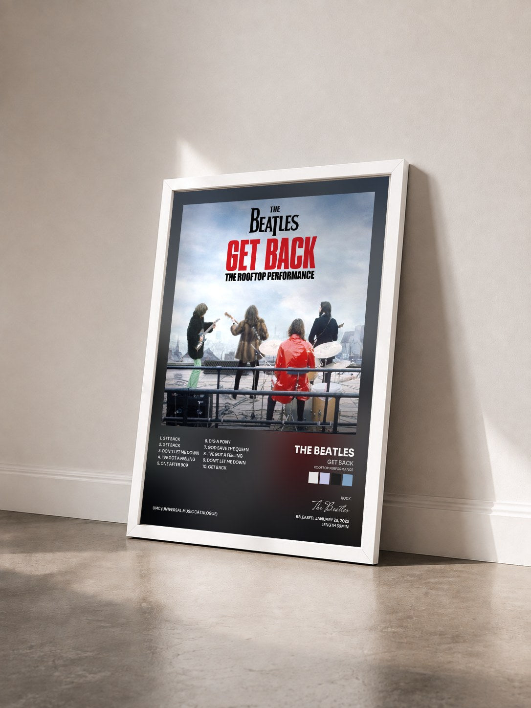 #blanc Tableau de l'album Get Back (Rooftop Performance) de The Beatles vu de trois quarts, cadre blanc