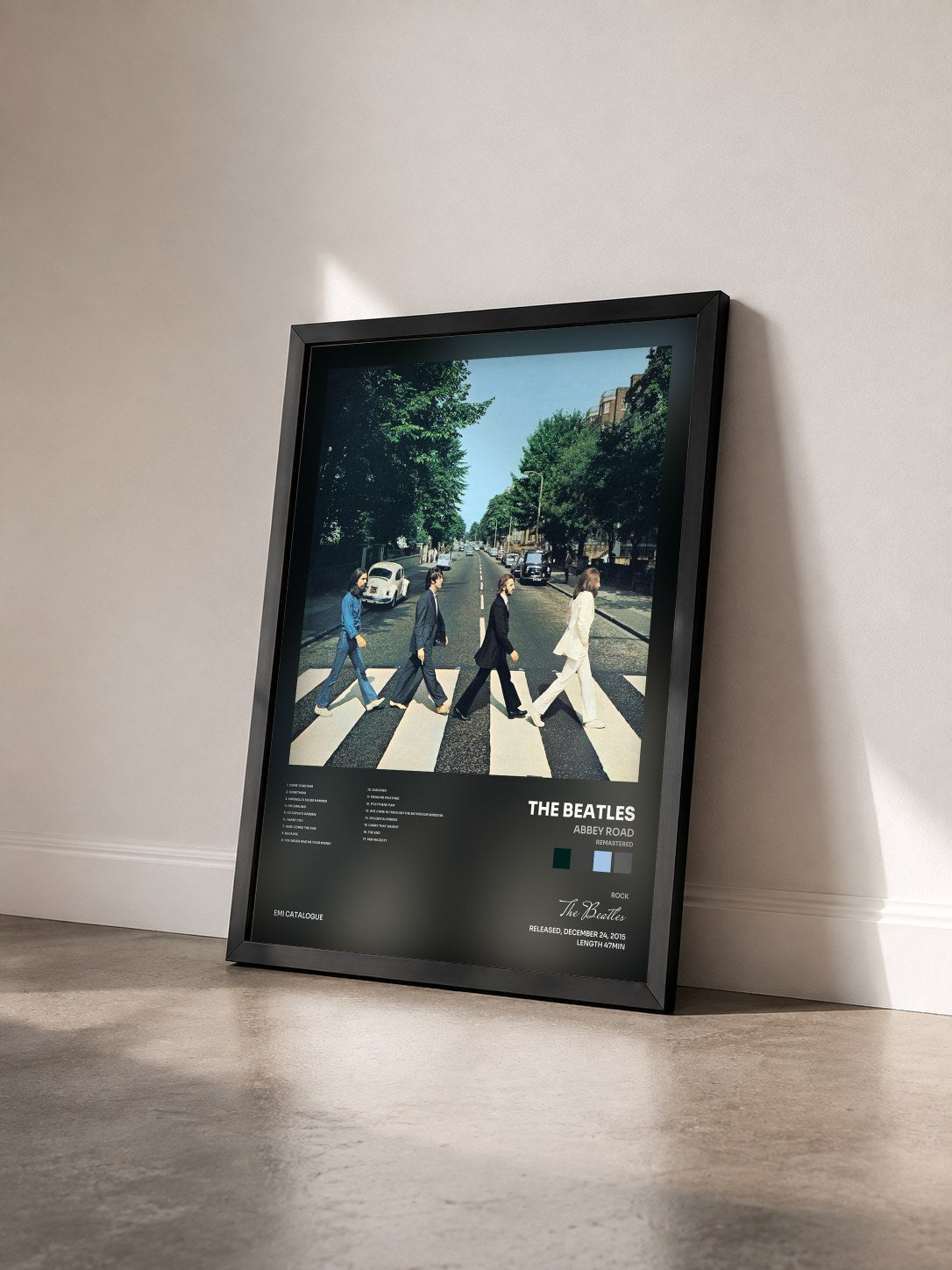 #noir Tableau de l'album Abbey Road (Remastered) de The Beatles vu de trois quarts, cadre noir