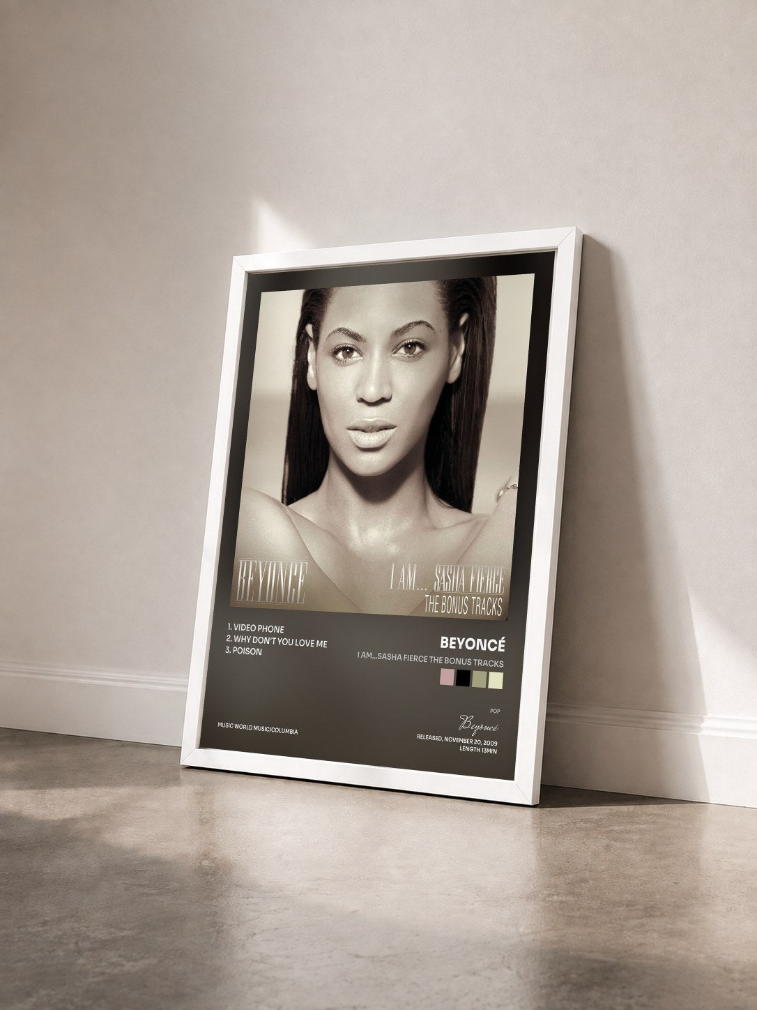 #blanc Tableau de l'album I AM...SASHA FIERCE THE BONUS TRACKS de Beyoncé vu de trois quarts, cadre blanc