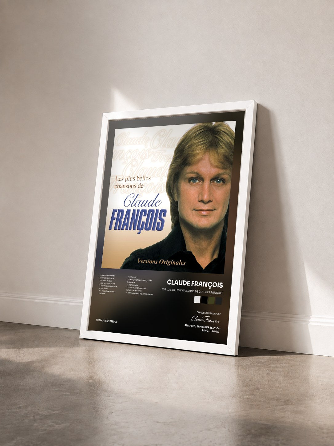 #blanc Tableau de l'album Les Plus Belles Chansons De Claude François de Claude François vu de trois quarts, cadre blanc