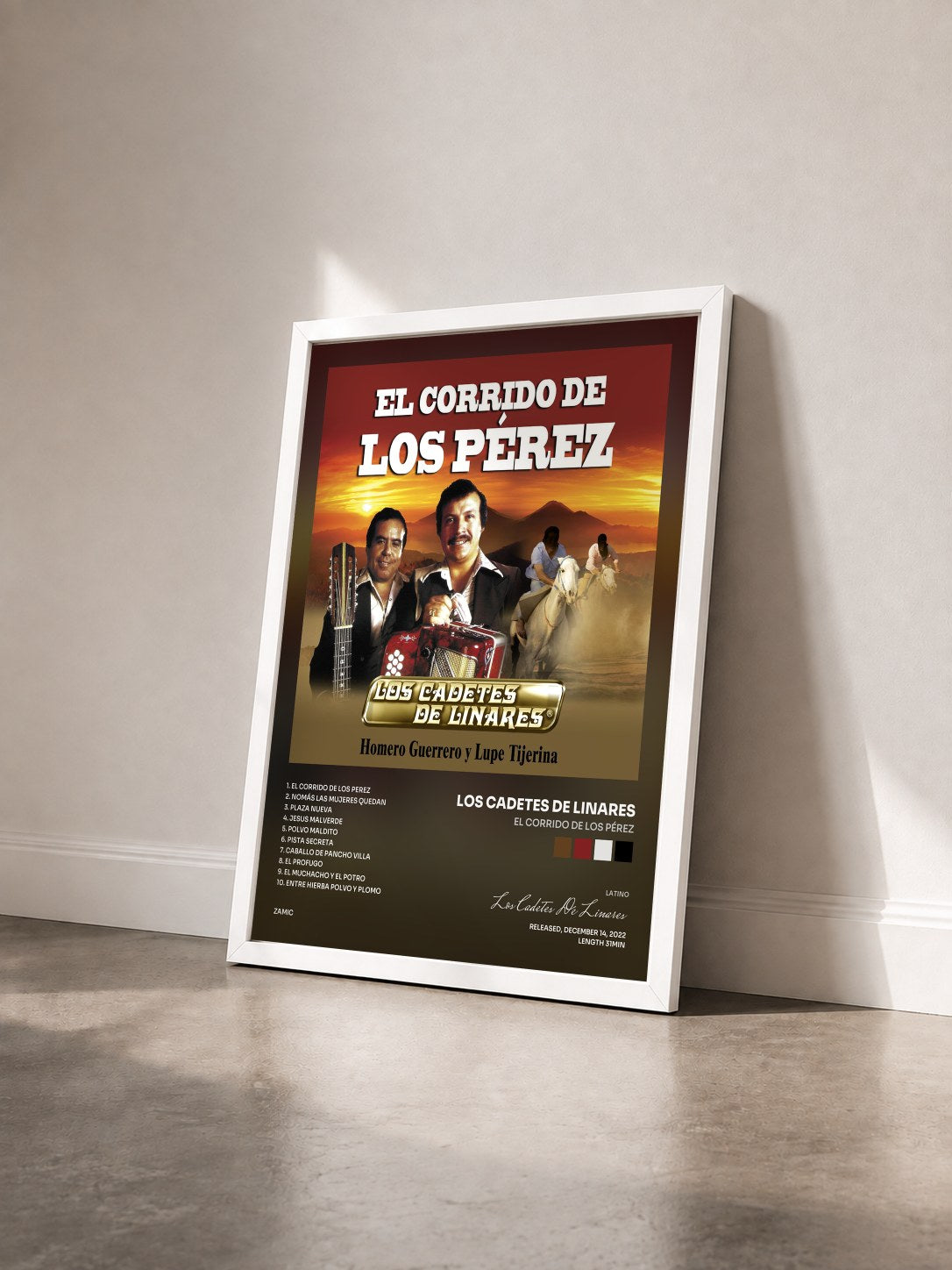 #blanc Tableau de l'album El Corrido De Los Pérez de Los Cadetes De Linares vu de trois quarts, cadre blanc