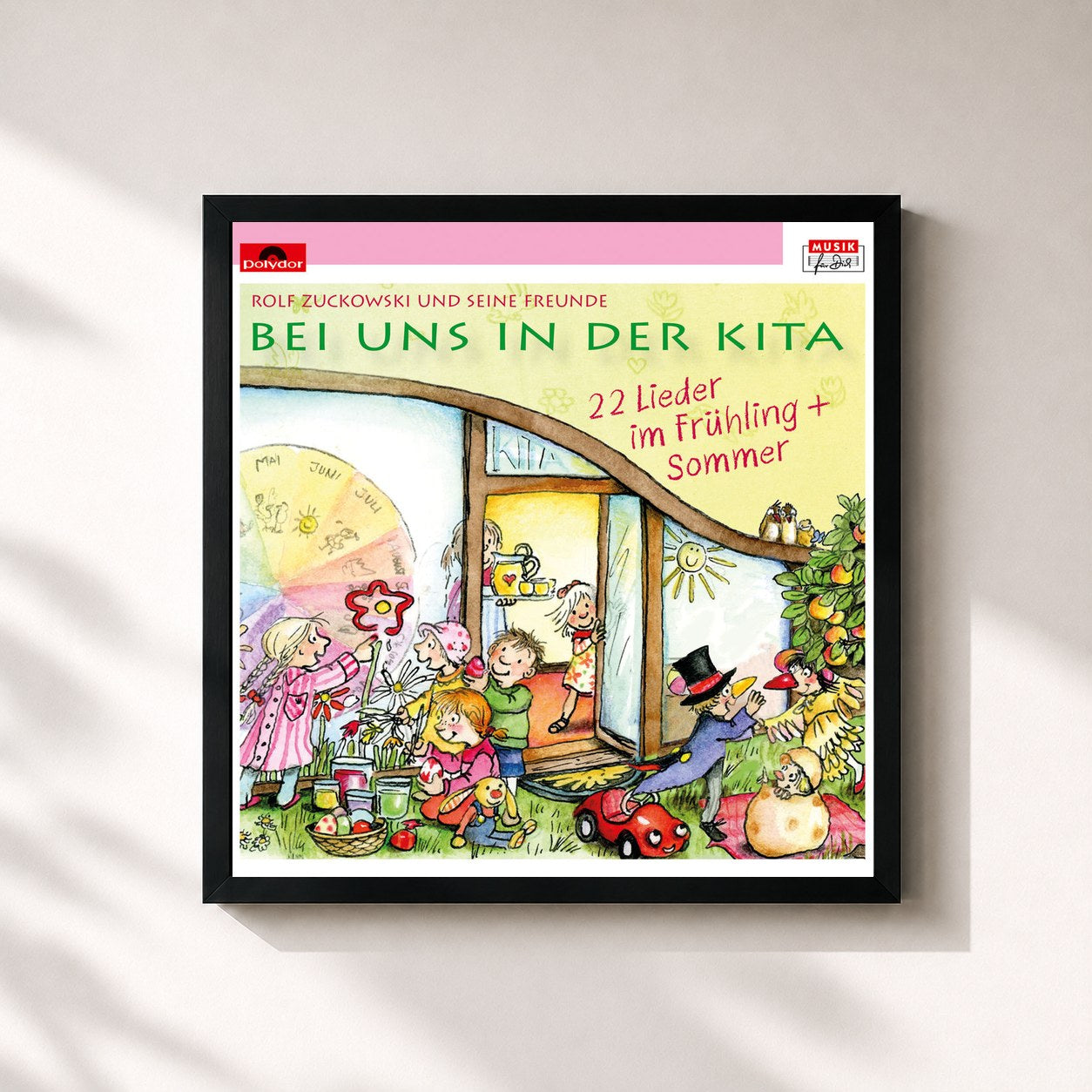 #noir Tableau carré de l'album Bei uns in der Kita - 22 Lieder im Frühling + Sommer de Rolf Zuckowski, cadre noir 32x32 cm