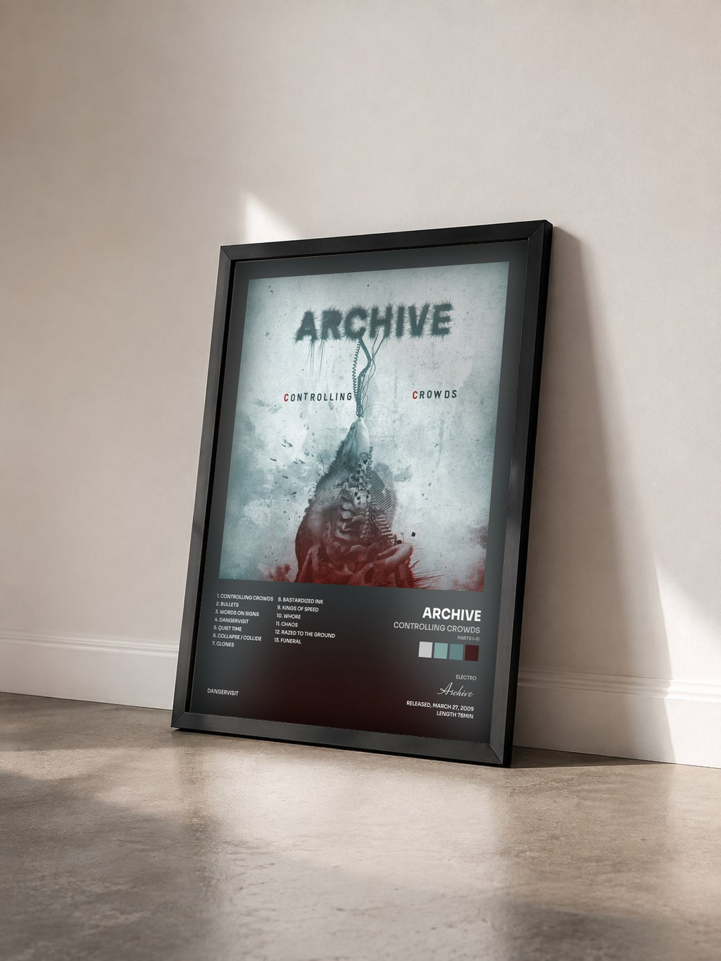 #noir Tableau de l'album Controlling Crowds (Parts I-III) de Archive vu de trois quarts, cadre noir
