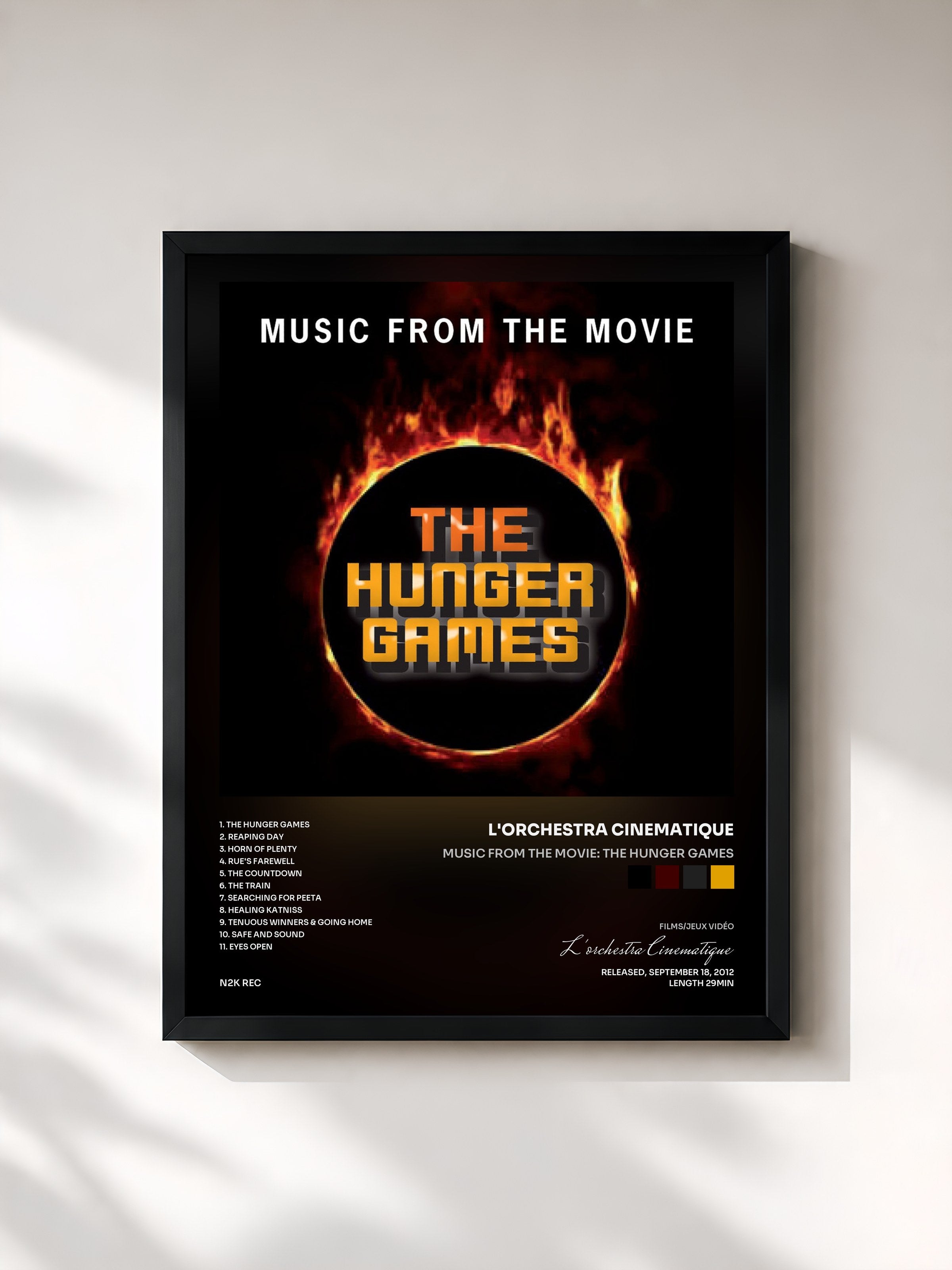 #noir Tableau de l'album Music from the Movie: The Hunger Games de L'orchestra Cinematique, cadre noir, imprimé et encadré en France