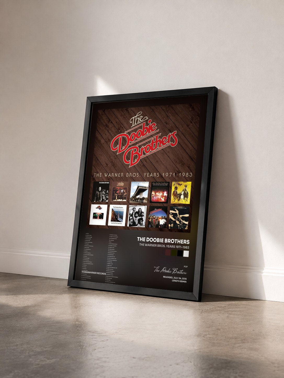 #noir Tableau de l'album The Warner Bros. Years 1971-1983 de The Doobie Brothers vu de trois quarts, cadre noir