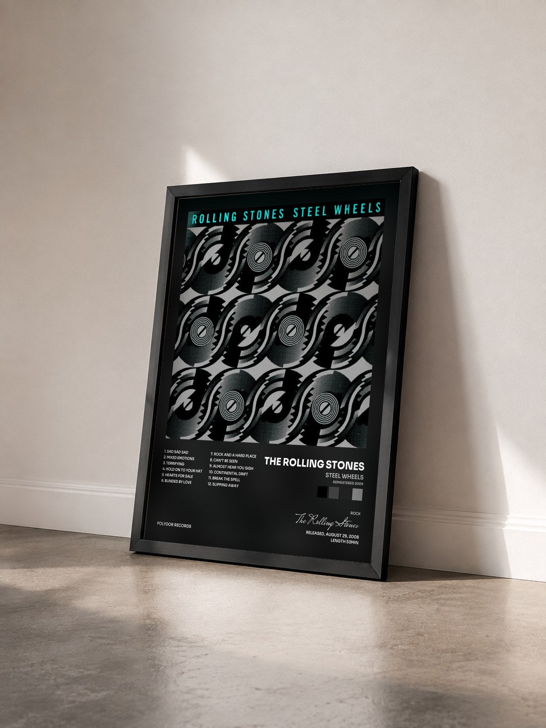 #noir Tableau de l'album Steel Wheels (Remastered 2009) de The Rolling Stones vu de trois quarts, cadre noir