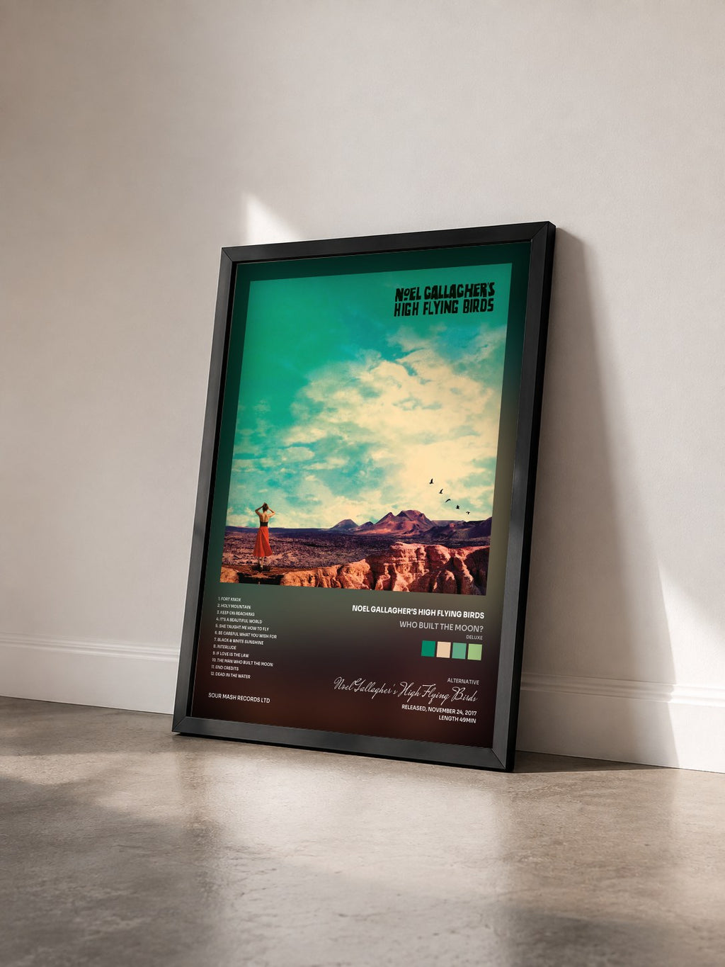 #noir Tableau de l'album Who Built The Moon? (Deluxe) de Noel Gallagher's High Flying Birds vu de trois quarts, cadre noir