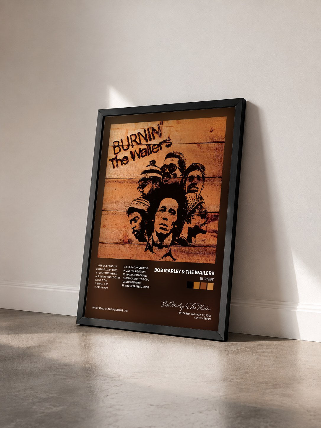 #noir Tableau de l'album Burnin' de Bob Marley & The Wailers vu de trois quarts, cadre noir