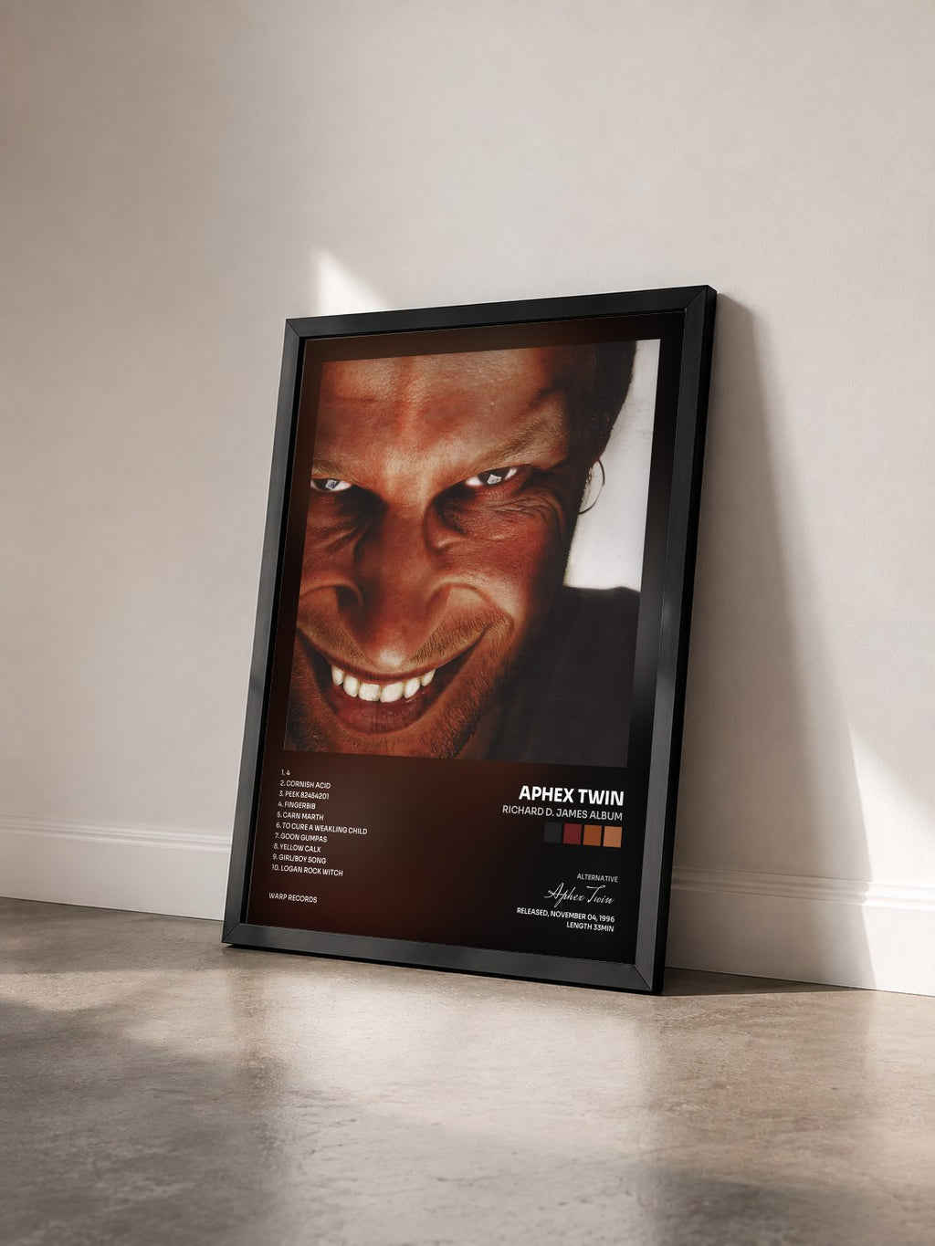#noir Richard D. James Album von Aphex Twin als gerahmter Kunstdruck von schräg gesehen, schwarzer Rahmen