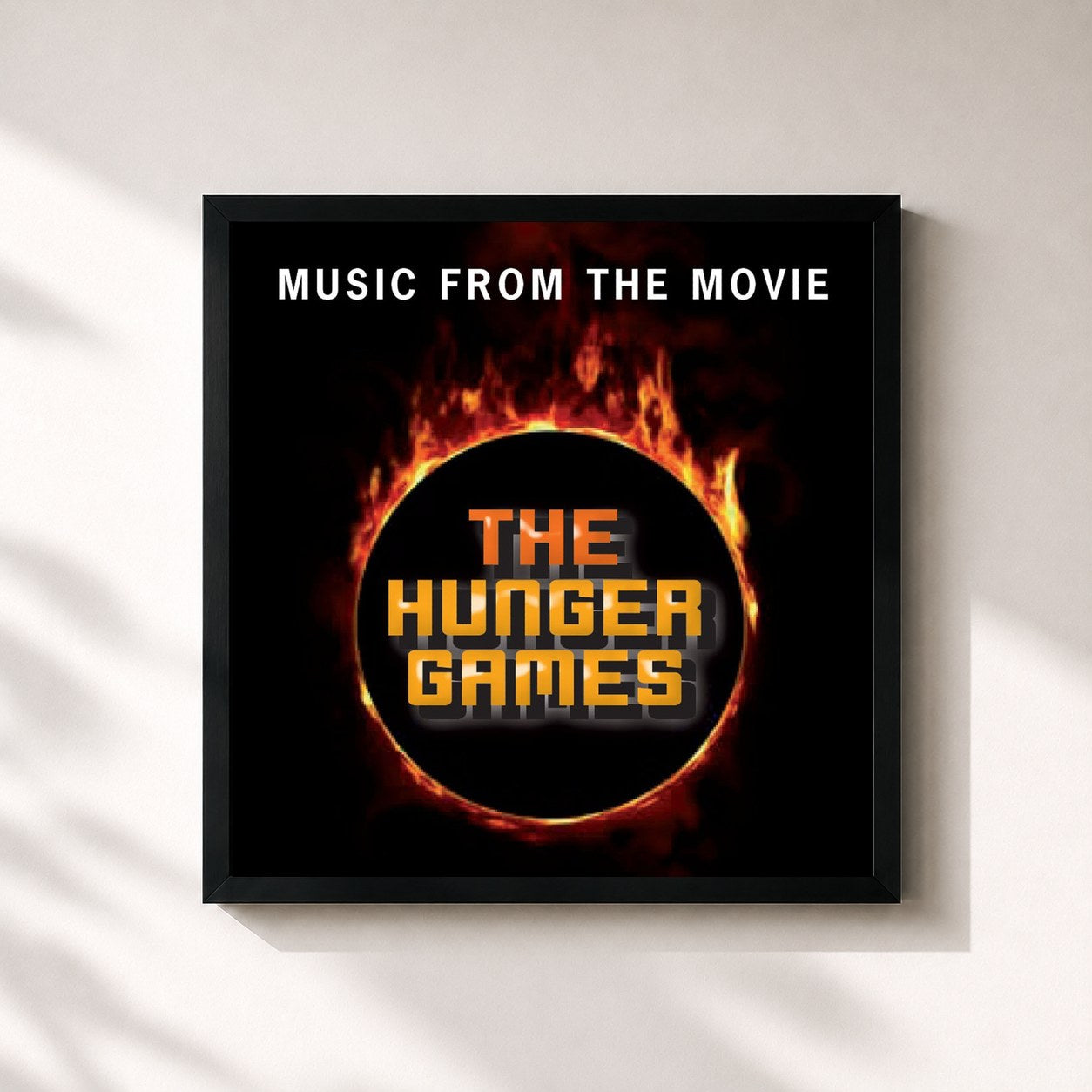 #noir Tableau carré de l'album Music from the Movie: The Hunger Games de L'orchestra Cinematique, cadre noir 32x32 cm