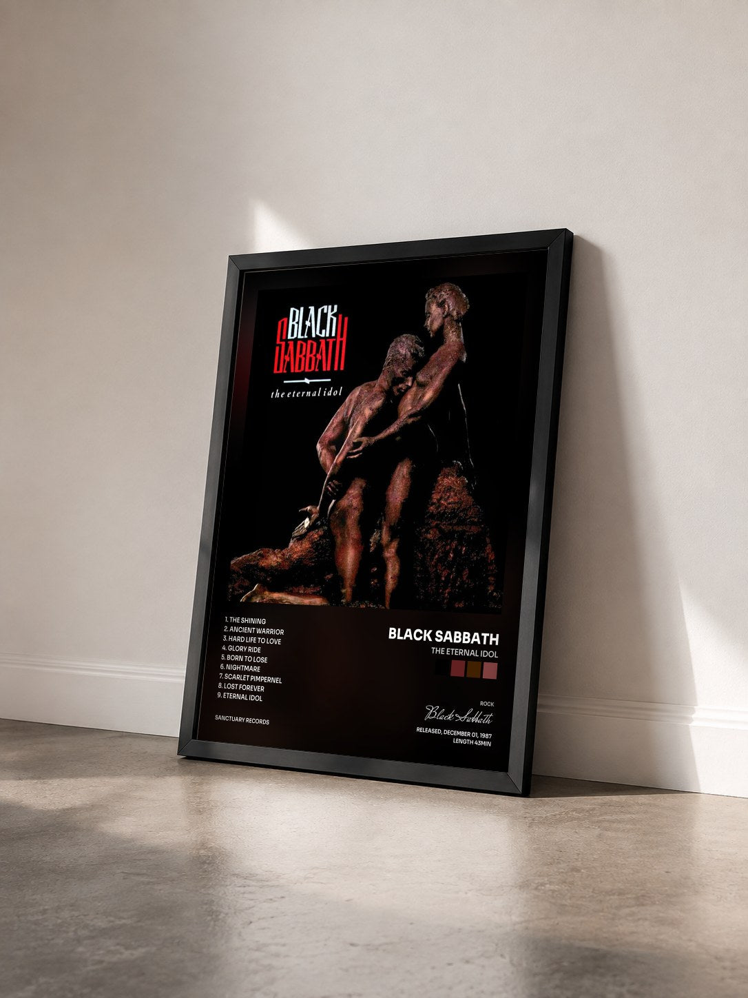 #noir Tableau de l'album The Eternal Idol de Black Sabbath vu de trois quarts, cadre noir