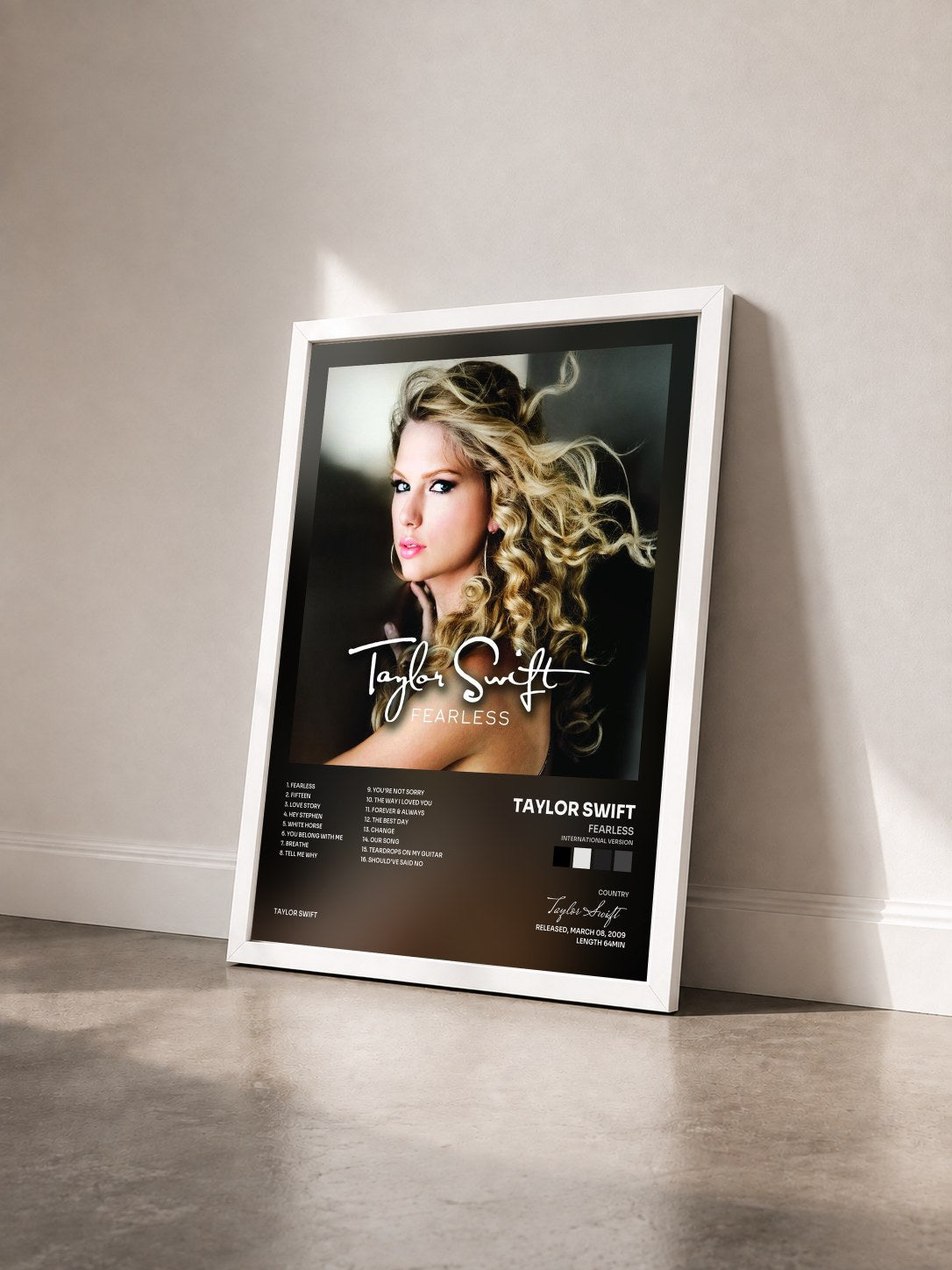 #blanc Fearless (International Version) by Taylor Swift as a framed art print seen at an angle, white frame