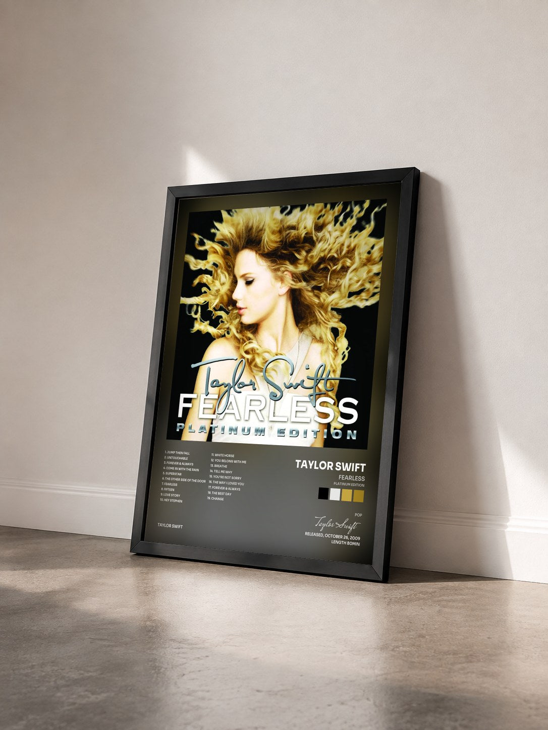 #noir Tableau de l'album Fearless (Platinum Edition) de Taylor Swift vu de trois quarts, cadre noir